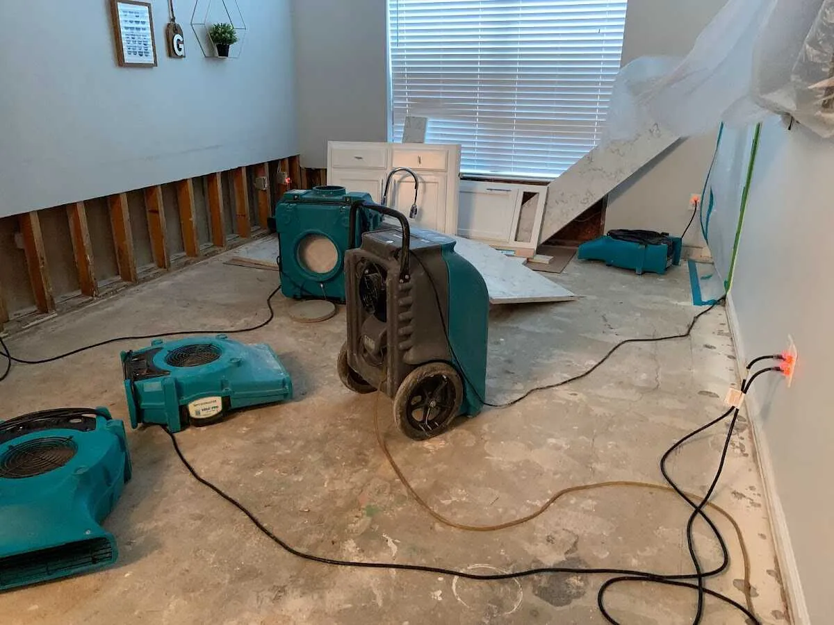 Dehumidifier in flood-cut room for Water Damage Restoration in Cedar Mill